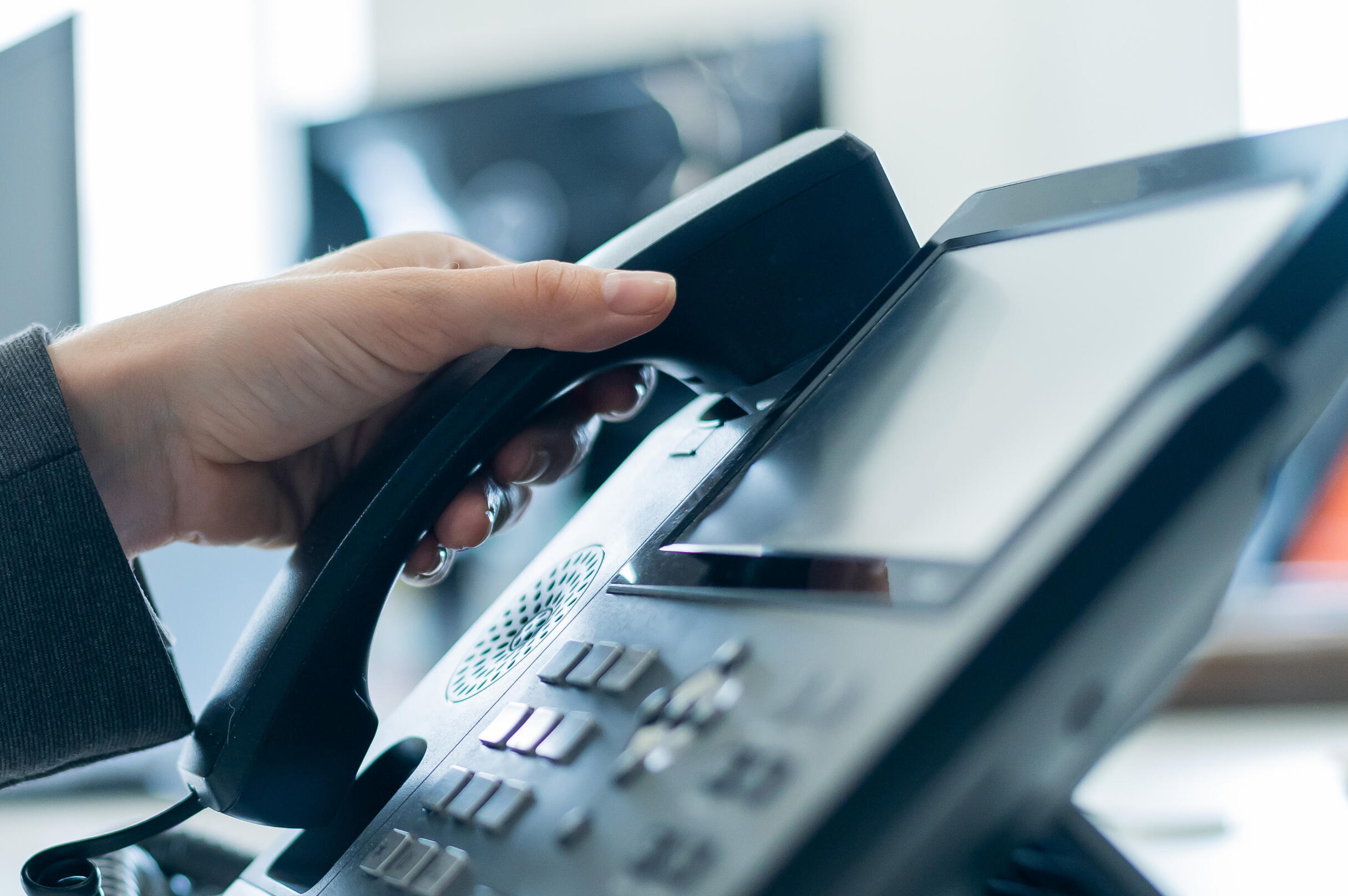 Answering an office telephone
